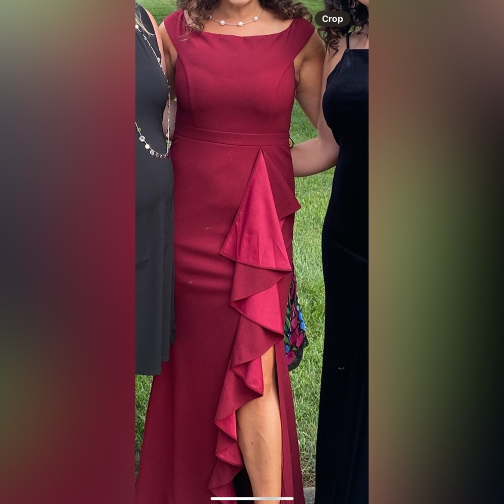 Burgundy/wine formal dress. Ruffle slit in front